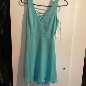 Perfect brand new dress still with tags the dress is a 3/4 dress be for a teen